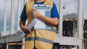 Construction worker, tablet and portrait of man with research and digital data for solar panel installation. Happy, engineer and male contractor with eco and energy project with tech and online plan video