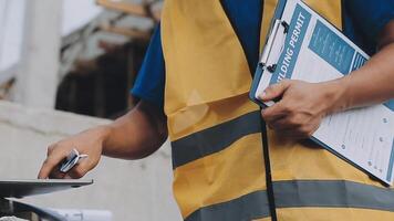Construction worker, tablet and portrait of man with research and digital data for solar panel installation. Happy, engineer and male contractor with eco and energy project with tech and online plan video