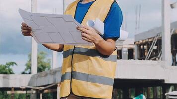 Construction worker, tablet and portrait of man with research and digital data for solar panel installation. Happy, engineer and male contractor with eco and energy project with tech and online plan video