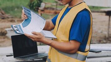 Construction worker, tablet and portrait of man with research and digital data for solar panel installation. Happy, engineer and male contractor with eco and energy project with tech and online plan video