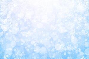 Abstract winter background with snowfall in bokeh photo