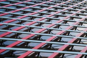 Abstract view of a fragment of modern building of glass and metal as background photo