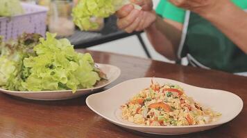 steaming mixed vegetables in the wok, asian style cooking vegetarian and healthy, selected focus, narrow depth of field video