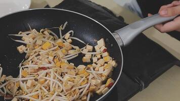 steaming mixed vegetables in the wok, asian style cooking vegetarian and healthy, selected focus, narrow depth of field video