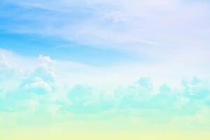 Turquoise fluffy clouds in azure sky as background photo