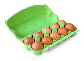 Open green cardboard box with brown chicken eggs isolated on a white background with shadow photo