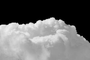Fragment of a white cumulus fluffy clouds isolated on a black background photo
