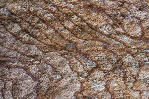 Surface of natural stone as texture, background photo