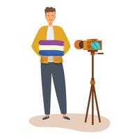 Smiling man holding stack of clothes recording blog using camera on tripod vector