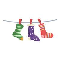 Three christmas stockings hanging on clothesline waiting for santa claus vector