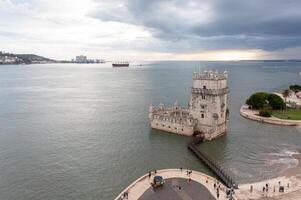 Belem Tower on Tagus river in Lisbon, Aerial view Portugal Evening time photo