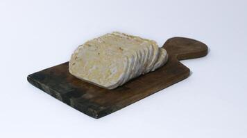 Raw tempe wrapped in banana leaves, Indonesian traditional food, create from soybean photo
