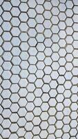 Close up of hexagonal pattern on the wall. Abstract background. photo