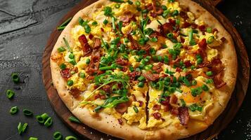 Breakfast pizza with a crispy crust, topped with scrambled eggs, bacon, cheese, and green onions. photo