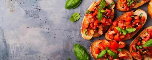 Classic bruschetta with diced tomatoes, garlic, basil, and balsamic glaze on toasted baguette slices. photo