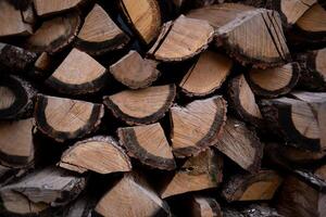 neatly stacked firewood, great background for design photo