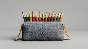 Pencil case with colorful pencils in empty studio room photo