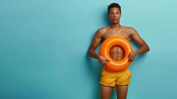 Interesting summer photo of a man with an inflatable ring