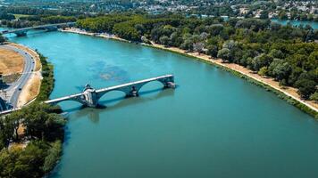 Broken bridge Saint-Benezet in the city of Avignon in Provence. famous Avignon bridge over the Rhone depicted in paintings, poems, stamps. architecture seen from a drone with its arches. photo