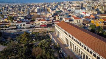 Stoa of Attalus, a completely renovated structure of Greek civilization, in the Agora in Athens. It attracts tourists for its Agora museum and the wonder of classical Greek art. Aerial view Agora park photo