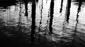 Monochrome Reflections Abstract Patterns in Rippling Water photo