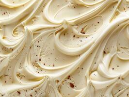 Creamy White Frosting Swirled with Dark Chocolate Sprinkles photo