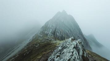 Majestic Misty Mountain Ridge A Mysterious and Ethereal Landscape photo