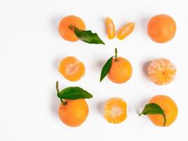 Christmas mandarin or tangerines seamless pattern. Isolated on white with clipping path. Top view or flat-lay. Copy space. photo