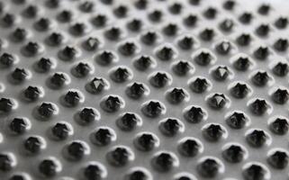 Pattern Of Perforated Metal Food Grater Surface Detailed Photo