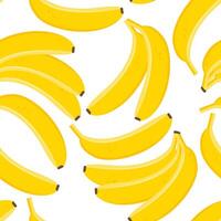 Tropical fruits yellow bananas are chaotically scattered on a white background, forming a seamless pattern. vector