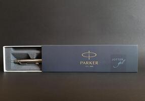Paris, France-11.08.2020 Parker Ballpoint pen on a black isolated background. Parker pen in a box top view photo