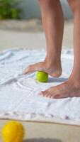 Enjoy a pampering foot massage with lime on a soft towel for relaxation and wellness video
