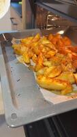 Freshly baked potato wedges seasoned with herbs are a tasty and healthy snack with a crispy texture video