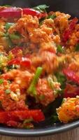 Scrambled Eggs with Fresh Vegetables Close Up View, perfect for a vibrant breakfast or brunch video