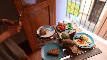 Enjoy a Gourmet Brunch featuring Fresh Vegetables and Eggs in a Cozy Home Setting video