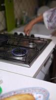 Cooking on a Gas Stove with a Modern Kitchen Setup for efficient meal preparation video