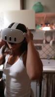 During this modern VR experience, a woman is fully immersed in a digital setting video