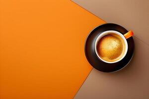 Flat lay of a coffee cup on a brown and orange background, space for copy or design photo