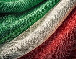 Italian flag colors on textured fabric photo