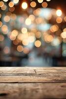 Empty wooden table in blur background of restaurant at night photo