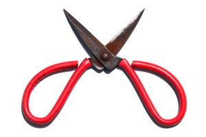 Vintage Rusty Metal Scissors with Red Handles Isolated on White Background for Craft and DIY Projects photo