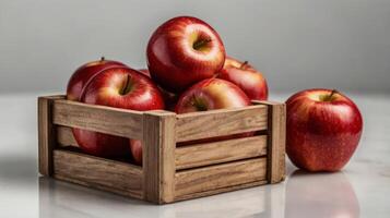 red apples in wooden box on transparent background photo