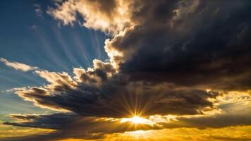 Sunlight illuminating a colorful sky through dark dramatic clouds. photo