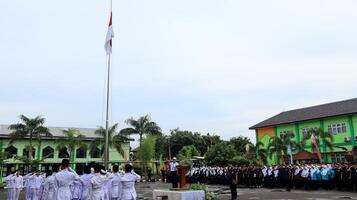 Paskibraka an Indonesian flag raiser during the while on duty at the flag ceremony photo