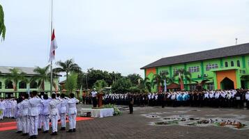 Paskibraka an Indonesian flag raiser during the while on duty at the flag ceremony photo