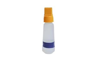 glue papper. liquid glue, streaming light transparent liquid. isolated on white background photo
