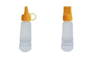 glue papper. liquid glue, streaming light transparent liquid. isolated on white background photo