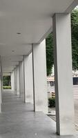 Interior of a modern building with arches and white columns. photo