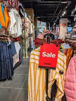Galway, Ireland - Jun 02. 2024, Sale at Diesel brand shop, popular fashion and clothing style, apparel and accessories photo