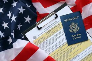 Department of State form DS11 Application for a U.S. Passport lies on table and ready to fill photo